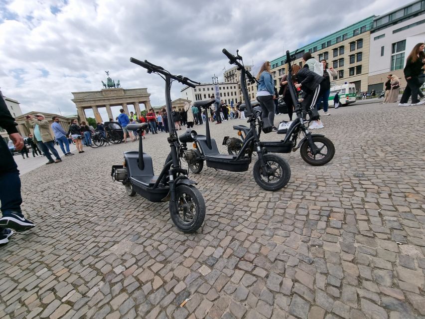 2-H Berlin: Top Sights Guided E-Scooter Tour - The Reichstag and the story behind its fire