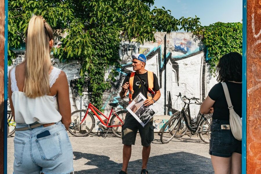 Berlin: Cold War Era History Guided Bike Tour - Guide style and group experience