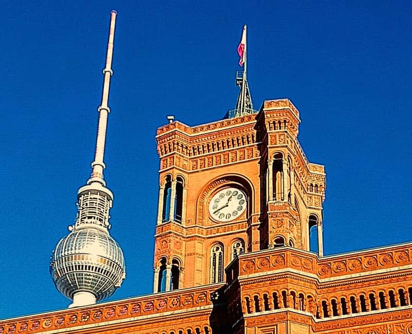 Berlin: East and West Wall Tour by Bike with a Guide - Friedrichshain and the Grimm fountain