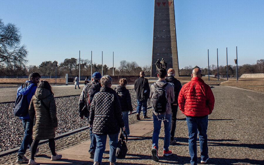 Berlin: Sachsenhausen Concentration Camp Museum Tour - Starting at Alexanderplatz with the white umbrella