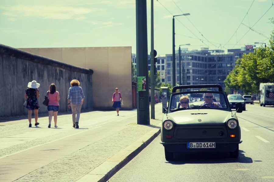 Berlin: The Wall Ride Guided Trabi Tour - Following the convoy through the former divided city