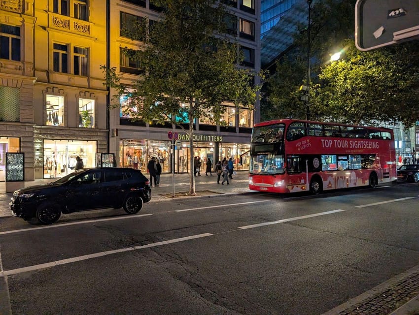 Christmas market lights tour bus through Berlin, free mulled wine (2.5 hours) - Checkpoint Charlie adds Berlin context
