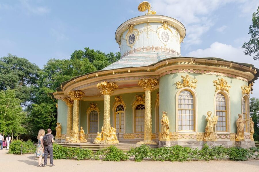 Potsdam: Sanssouci Palace and Prussian Palaces Entry Ticket - Walking through the Sanssouci garden