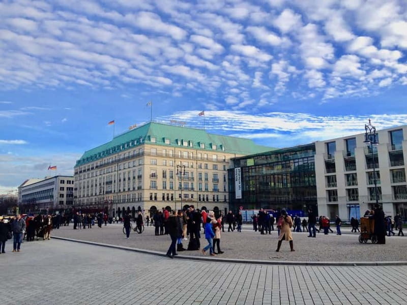 Private Taxi Tour through Berlin East and West and Kiez 4-6h - East Berlin means socialist avenues and Wall art