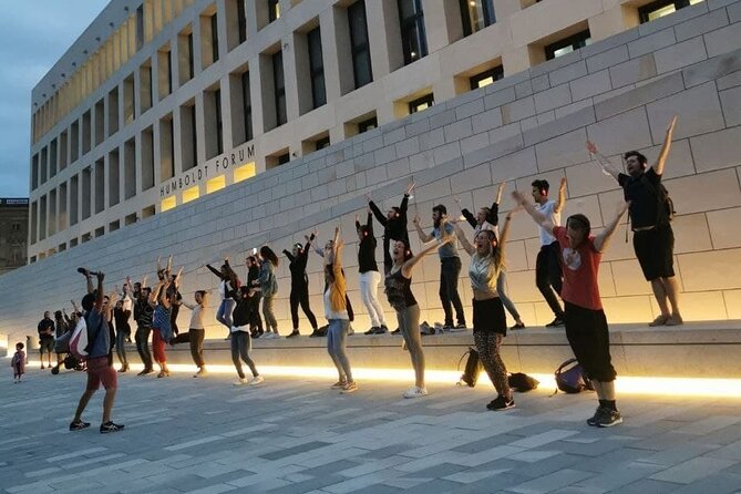 Silent disco through downtown Berlin with flash mobs - Berlin after dark, with headphones on